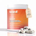 Brandl pure multi multivitamin kapseln mit orange-weißem etikett und silbernen kapseln daneben
