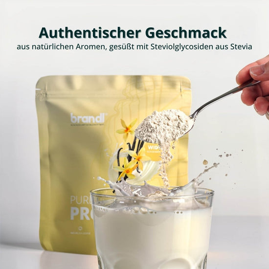 Ein goldener beutel brandl pure protein 2.0 whey pulver mit vanilleillustrationen und deutscher beschriftung