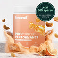 Brandi preworkout performance in tropical orange mit kaffeegeschmack in einer pfirsichfarbenen zylinderverpackung