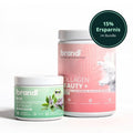 Pink und grüne supplementbehälter mit weißen deckeln und botanischen motiven im beauty & balance bundle