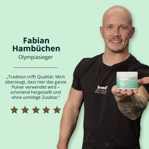 Ein kleiner zylindrischer behälter mit weißem deckel und hellgrünem label der marke brandl für bio hericium kapseln