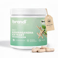 Brandl bio ksm 66 ashwagandha extrakt in weißem behälter mit grünem etikett und verstreuten beigen kapseln