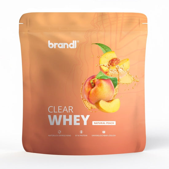 Brandi clear whey natürliches pfirsich aroma in glänzender orangefarbener verpackung mit lebendigen pfirsichmotiven