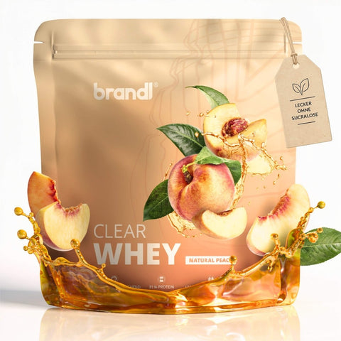 Brandi clear whey natürliches pfirsicharoma in glänzendem beigem beutel mit pfirsichmotiven und goldenen flüssigkeitsspritzern