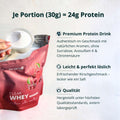 Ein lebendiges rotes pouch von brandl clear whey proteinpulver mit kirschgeschmack und silbernem reißverschluss