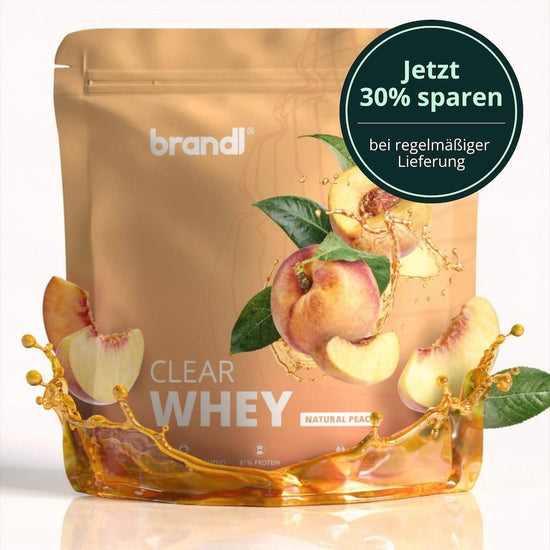 Brandl clear whey natürliches pfirsicharoma in goldbraunem wiederverschließbarem beutel mit pfirsich und flüssigkeitssplash