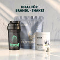 Schwarze premium-shaker-flasche aus kunststoff mit grünem logo und text ideal zum mixen von getränken