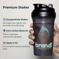 Schwarzer transparenter plastikshaker mit schwarzem deckel und teal logo der marke brandl premium-shaker