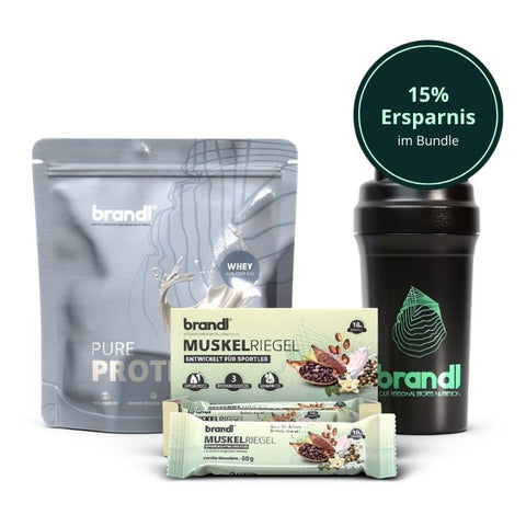 Schwarze shakerflasche mit grünem logo und strukturierter griff für protein basic bundle set