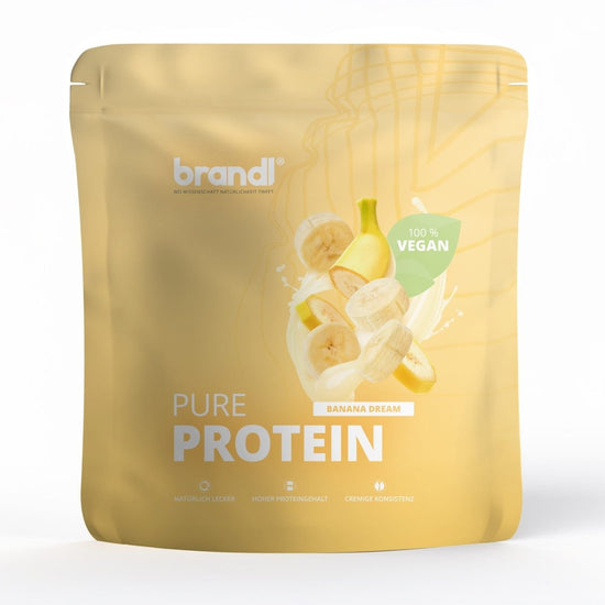 Brandl pure protein 2.0 vegan banana dream goldgelbe packung mit bananenscheiben und milchspritzern auf der front