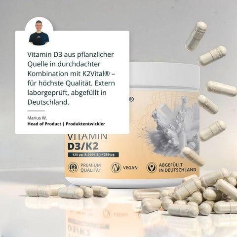 Beige weiße zylindrische vitamin d3 k2 kapseln mit grauem kristalldesign vegan premium qualität hergestellt in deutschland