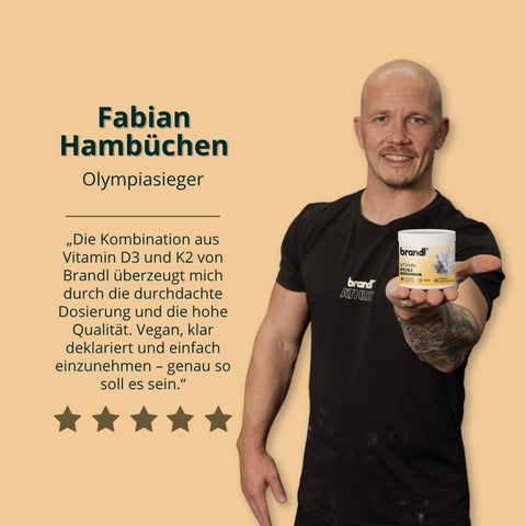Weiße zylindrische vitamin d3 k2 kapseln dose mit gelbem etiket und brandl logo in schwarz text